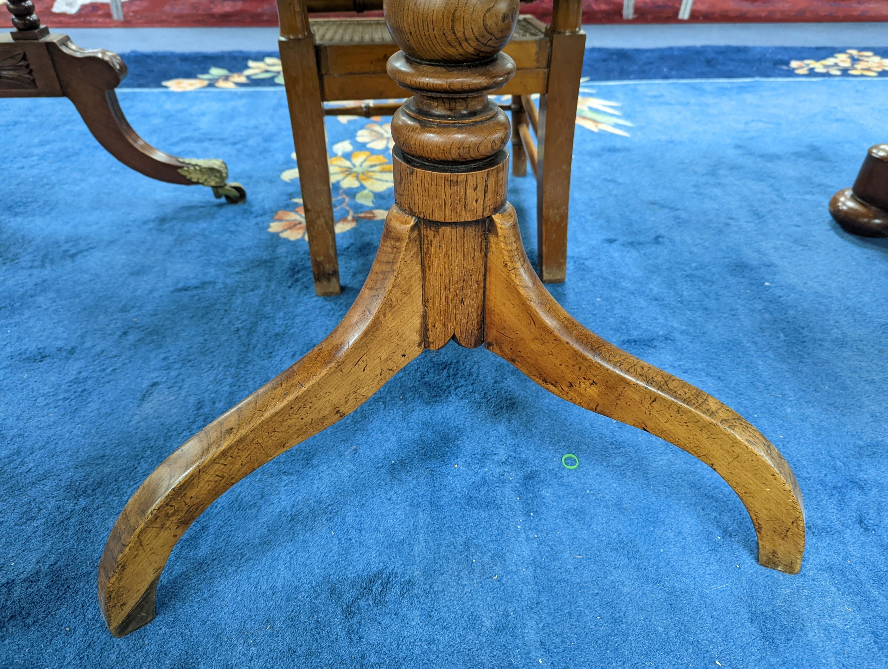 A Victorian rectangular oak tilt top tripod tea table, width 67cm, depth 56cm, height 74cm